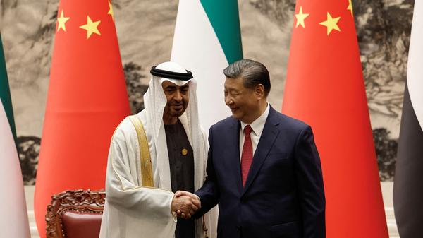 Chinese President Xi Jinping and United Arab Emirates President Sheikh Mohammed bin Zayed Al Nahyan shake hands following a signing ceremony at the Great Hall of the People in Beijing, China May 30, 2024. REUTERS/Tingshu Wang/Pool