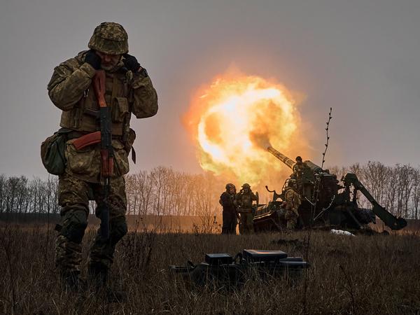 Ukrainian soldiers fired at Russian positions with a howitzer gun in the Bakhmut region.