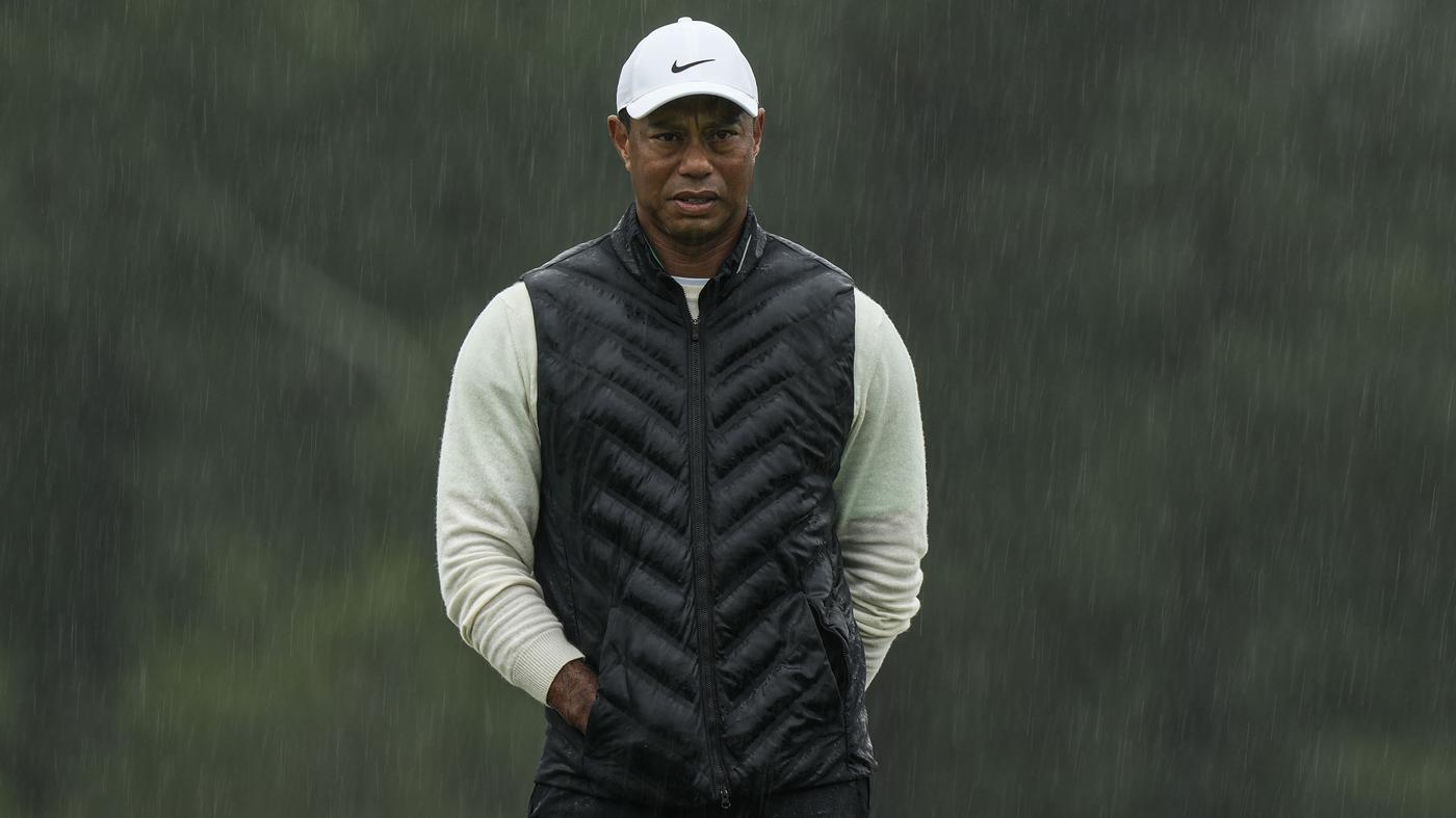 Tiger Woods sets Masters record in constant rain