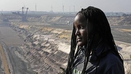 Climate activist Vanessa Nakate from Uganda during her visit to the Garzweiler open-cast coal mine in Luetzerath, western Germany, Saturday, Oct. 9, 2021. Garzweiler, operated by utility giant RWE, has become a focus of protests by people who want Germany to stop extracting and burning coal as soon as possible. (AP Photo/Martin Meissner)