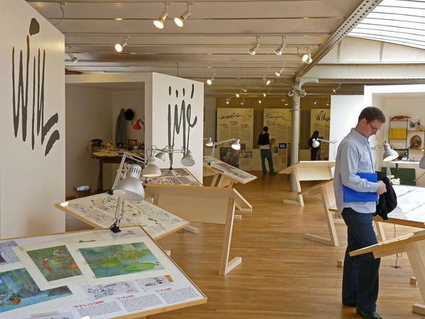 Atelier-Atmosphäre. Derzeit gibt eine Ausstellung in Brüssel Einblicke in die Arbeitsweisen von Franquin, Morris, Jijé und Will.