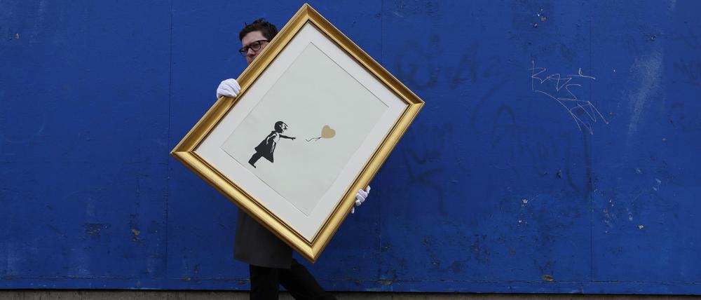 Der Londoner Auktionsriese Christie's bot schon 2019 Online-Verkäufe an. Hier "Girl with Balloon" vom Street-Art-Künstler Banksy.