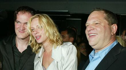 Dieses Bild von 2004 zeigt Uma Thurman mit Harvey Weinstein (r.) und Quentin Tarantino (l.).