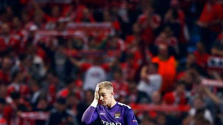 Alone in Munich. Joe Hart's blunders against FC Bayern did nothing to ease the criticism which is being poured upon him. 
