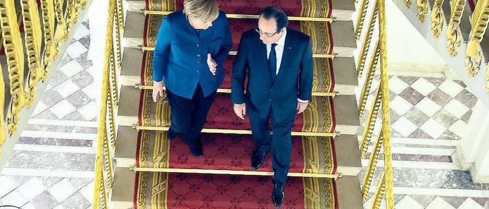 Nachbarn, Nationen. Die Kanzlerin und der Präsident im Elysée-Palast. Foto: dpa