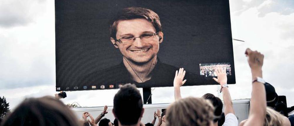 Kanzelworte. Der US-Whistleblower Edward Snowden bei einer Liveschaltung zum Musikfestival im dänischen Roskilde am 28. Juni 2016.