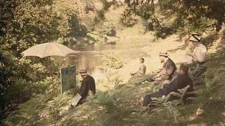 Armand Guillaumin beim Malen von „Badende bei Crozant“, fotografiert 1907 von Antonin Personnaz.