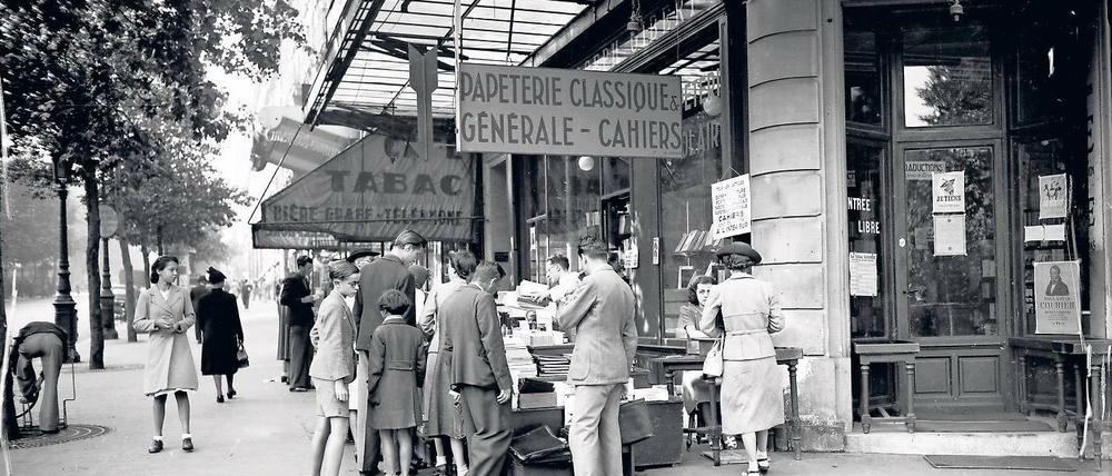 Heute befindet sich hier immer noch die Librairie Gilbert. Der Pariser Boulevard Saint-Michel um 1938/39. Foto: ullstein bild/Roger Viollet