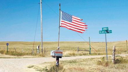 Hauptsache patriotisch. Straßenszene in South-Dakota, einem der von Büscher erlaufenen US-Staaten. Foto: mauritius