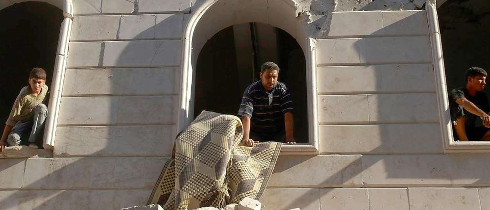 Zerstörte Häuserfassade in Aleppo, nach einem Luftangriff von Assads Armee.
