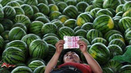 Ein Wassermelonenverkäufer in Changzhi, China. 