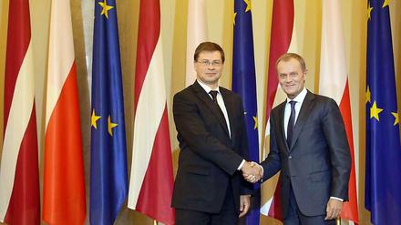 Valdis Dombrovskis und Donald Tusk.