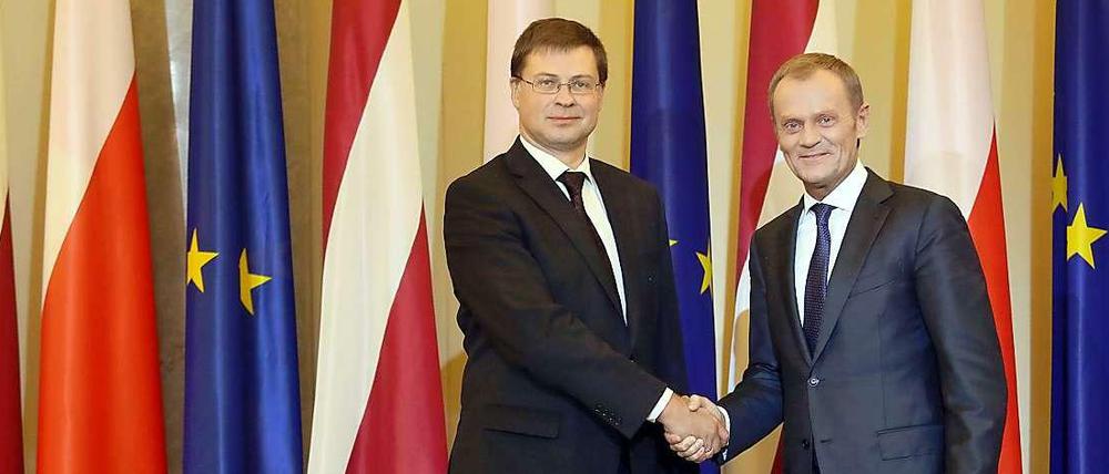 Valdis Dombrovskis und Donald Tusk.