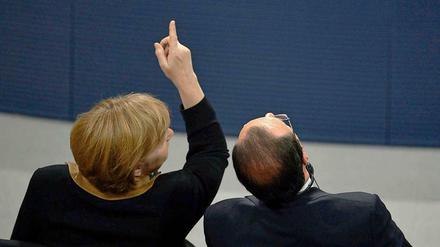 Merkel und Hollande im Bundestag. Zur Freundschaft gehört, den anderen auf Fehler aufmerksam zu machen.