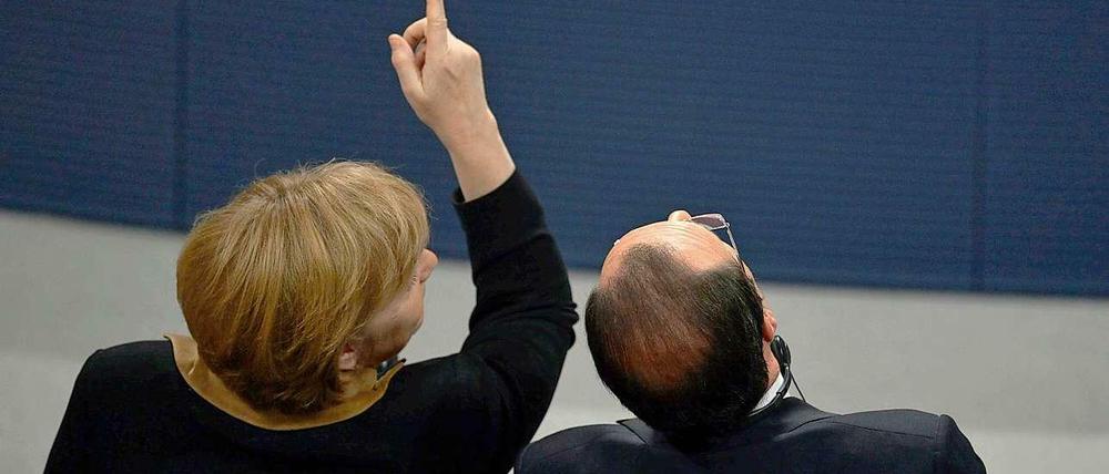 Merkel und Hollande im Bundestag. Zur Freundschaft gehört, den anderen auf Fehler aufmerksam zu machen.