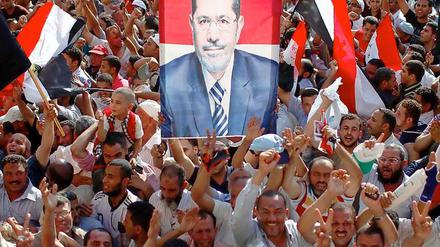Anhänger der Muslimbrüder feiern auf dem Tahrir-Platz in Kairo den Wahlsieg von Mohammed Mursi.