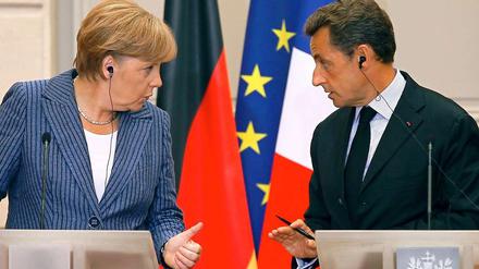 Bundeskanzlerin Angela Merkel und Frankreichs Staatspräsident Nicolas Sarkozy nach ihrem Treffen in Paris. 