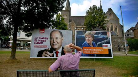Angela Merkel und Peer Steinbrück mögen in manchen Wahlkampf-Thema verschiedene Meinungen vertreten. Doch wenn es um steigende Mietpreise geht, zeigen sie Einigkeit.