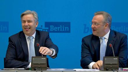 Sie verstehen sich demonstrativ gut: Berlins Regierender Wowereit (l.) und CDU-Chef Henkel.