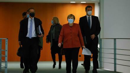 Michael Müller, Angela Merkel und Markus Söder nach der Bund-Länder-Schalte.
