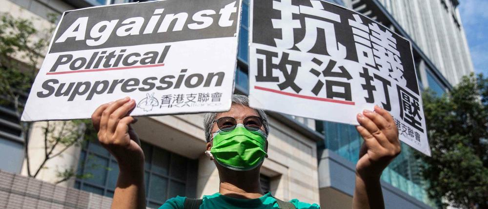 Protest gegen die Schuldsprüche für Hongkonger Demokratieaktivisten vor dem Gericht