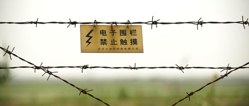 Ein Grenzzaun zwischen China und Nordkorea in der nordöstlichen chinesischen Liaoning-Provinz.
