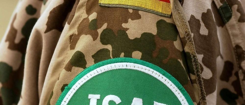 Die Militärabzeichen an der Uniform eines in Kabul eingesetzten Bundeswehrsoldaten.