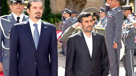 Irans Präsident Ahmadinedschad (r.) besucht den Libanon.
