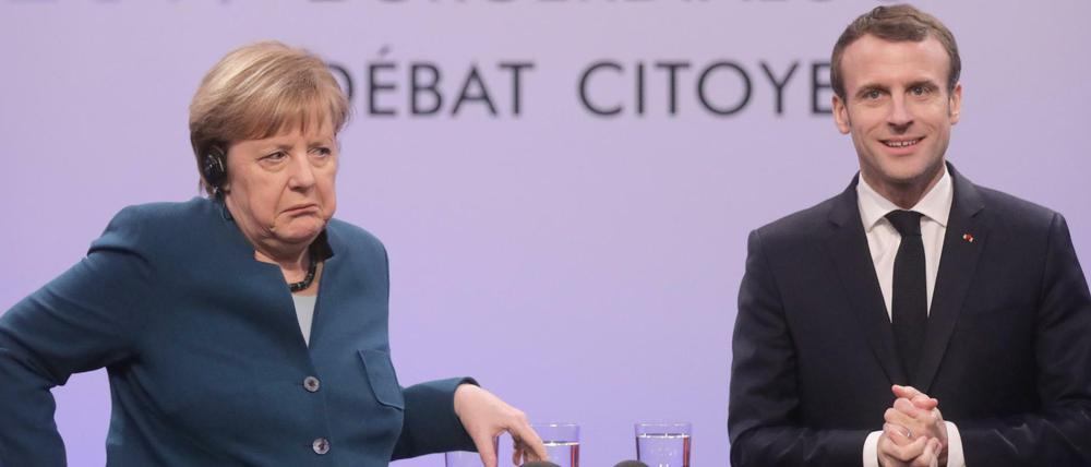 Bundeskanzlerin Merkel und Frankreichs Präsident Macron im Januar bei einem Bürgerdialog in Aachen.