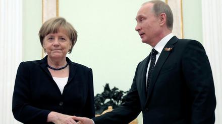 Kanzlerin Angela Merkel und Präsident Wladimir Putin bei einem Treffen in Moskau 2015.