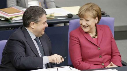 Siegerlächeln und gute Miene: Merkel und Gabriel.