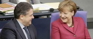 Siegerlächeln und gute Miene: Merkel und Gabriel.