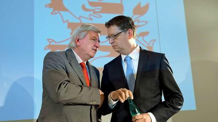 Drohendes Patt. Hessens Ministerpräsident Volker Bouffier (CDU, links), Herausforderer Thorsten Schäfer-Gümbel (SPD)