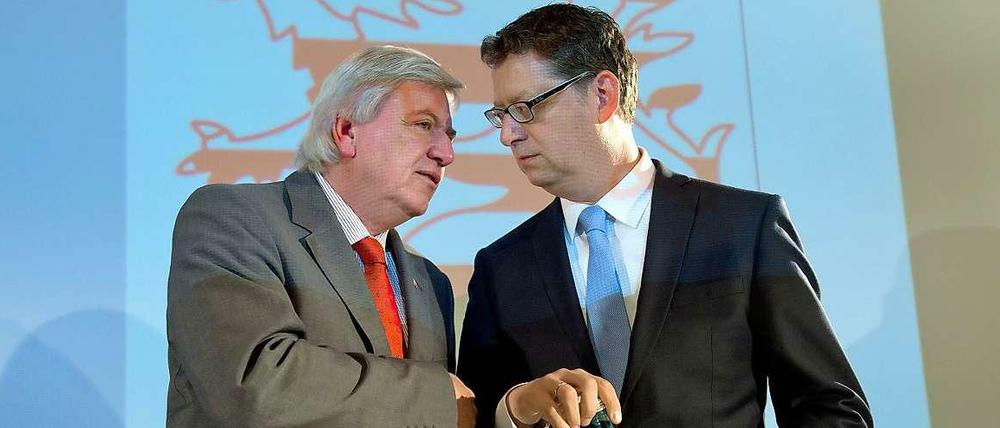 Drohendes Patt. Hessens Ministerpräsident Volker Bouffier (CDU, links), Herausforderer Thorsten Schäfer-Gümbel (SPD)