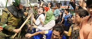 Protest. Am 5. Juli 2009 eskalierten die Auseinandersetzungen in Xinjiang.