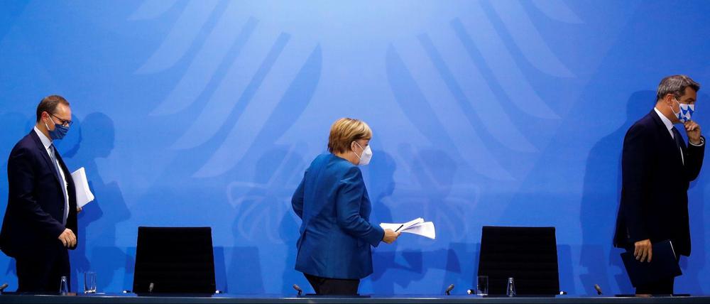 Bundeskanzlerin Angela Merkel (CDU), der bayerische Ministerpräsident Markus Söder (CSU) und Berlins Regierender Bürgermeister Michael Müller (SPD)