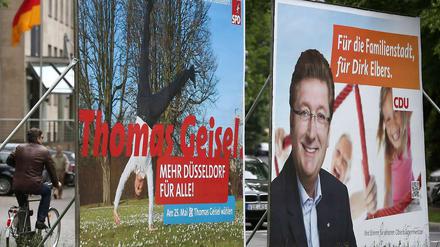 Plakate von SPD und CDU in Düsseldorf.