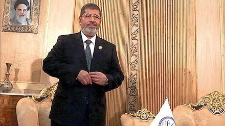 Historischer Besuch. Ägyptens Präsident Mursi bei seiner Ankunft in Teheran. Irans Führung hatte von dem islamistischen Präsidenten einen Schulterschluss erhofft.