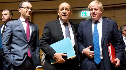 Bundesaußenminister Heiko Maas (SPD), mit seine Kollegen aus Frankreich und Großbritannien Jean-Yves Le Drian und Boris Johnson in Luxemburg. 