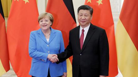 Chinas Präsident Xi Jinping bei einem Treffen mit Angela Merkel im Jahr 2018.
