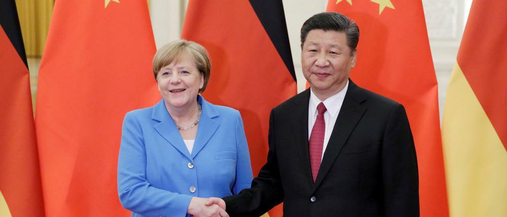 Chinas Präsident Xi Jinping bei einem Treffen mit Angela Merkel im Jahr 2018.