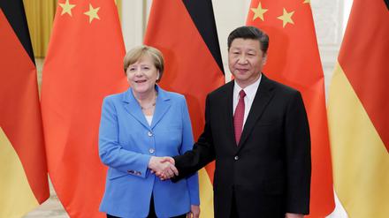 Von Sozialdemokraten neuerdings misstrauisch beäugt: Angela Merkel und Chinas Präsident Xi Jinping -hier 2018 in Peking.