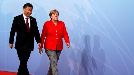 Bundeskanzlerin Angela Merkel (CDU) und Chinas Präsident Xi Jinping auf einem Archivbild.