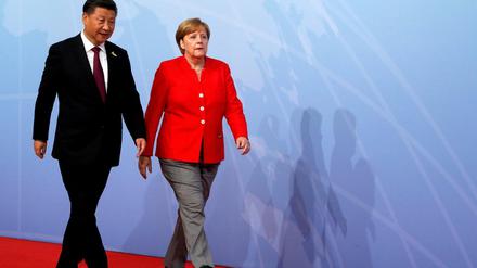 Erfolgreicher Druck: Die EU und Deutschland kuschen vermehrt gegenüber China. Präsident Xi Jinping und Bundeskanzlerin Angela Merkel. 