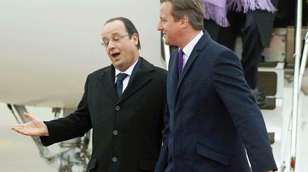 Hollande (links) besucht Cameron in Großbritannien.