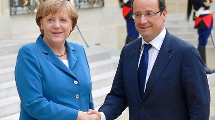 Kanzlerin Merkel und Staatschef Hollande vertreten unterschiedliche politische Lager. Nachdem sie bei zwei EU-Gipfeln heftig aneinandergerieten, suchen sie wieder den Konsens.