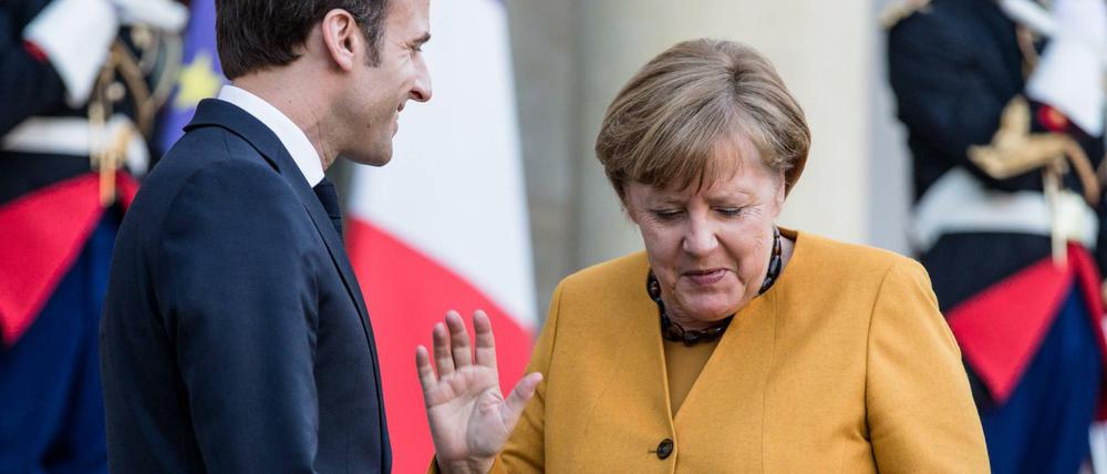 Frankreichs Staatschef Macron und Kanzlerin Merkel bei einem Treffen im vergangenen Februar in Paris. 