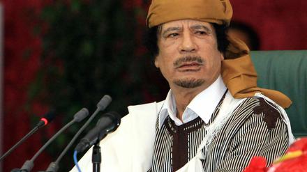 Muammar al Gaddafi.