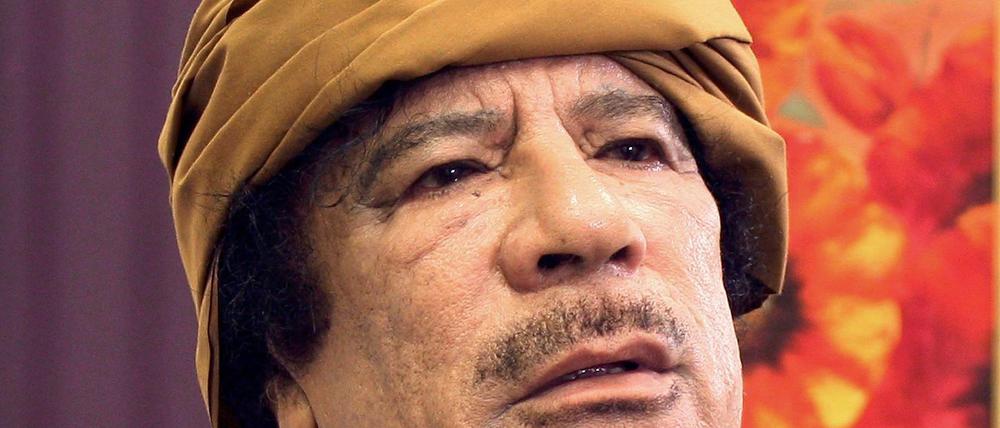 Muammar al Gaddafi.