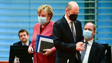 Auch die Coronakrise übergibt Angela Merkel ihrem wahrscheinlichen Nachfolger Olaf Scholz. 